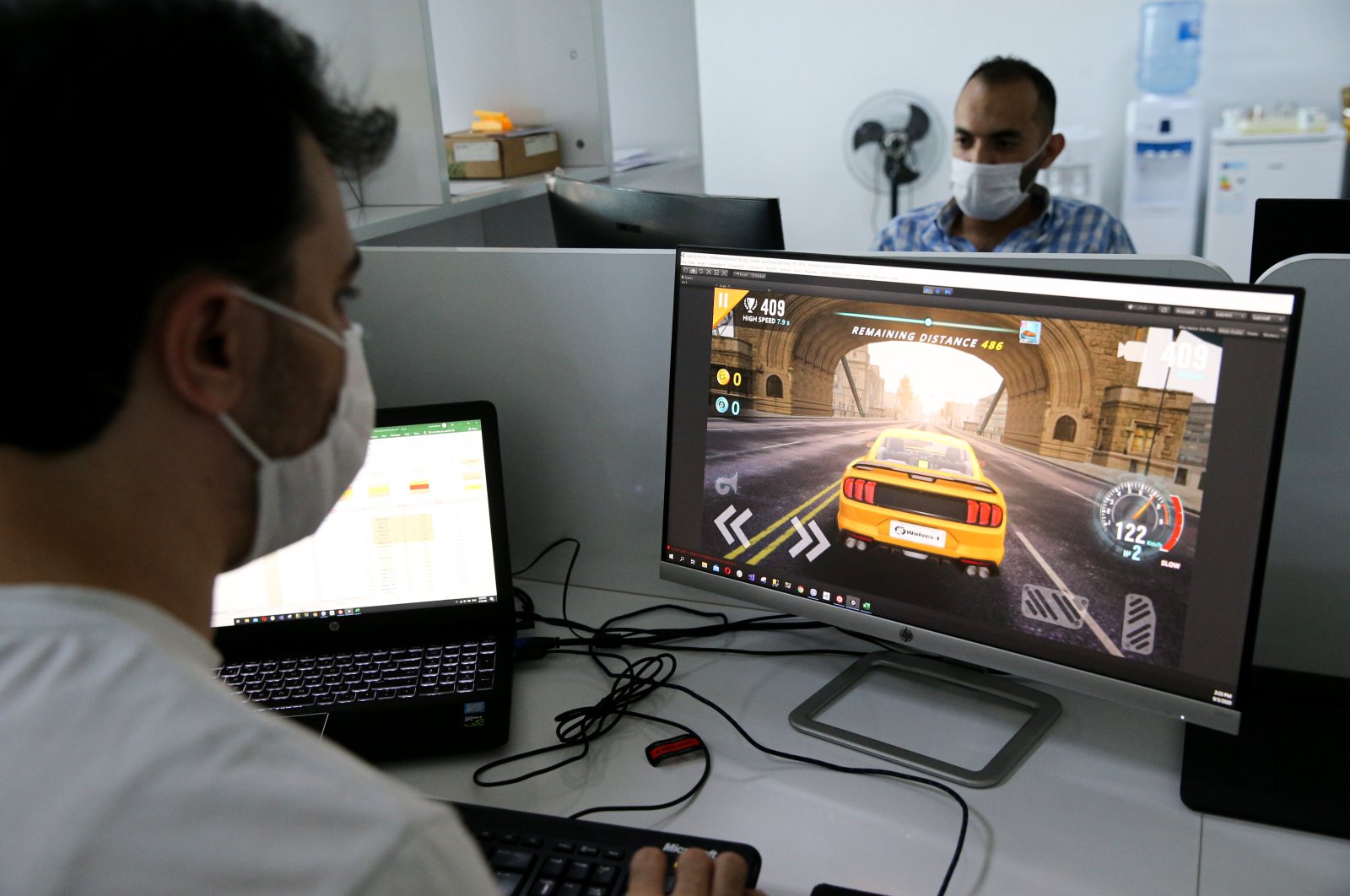 A company employee gives a preview of the game "Traffic Tour," Istanbul, Turkey, Sept. 11, 2020. (AA Photo)