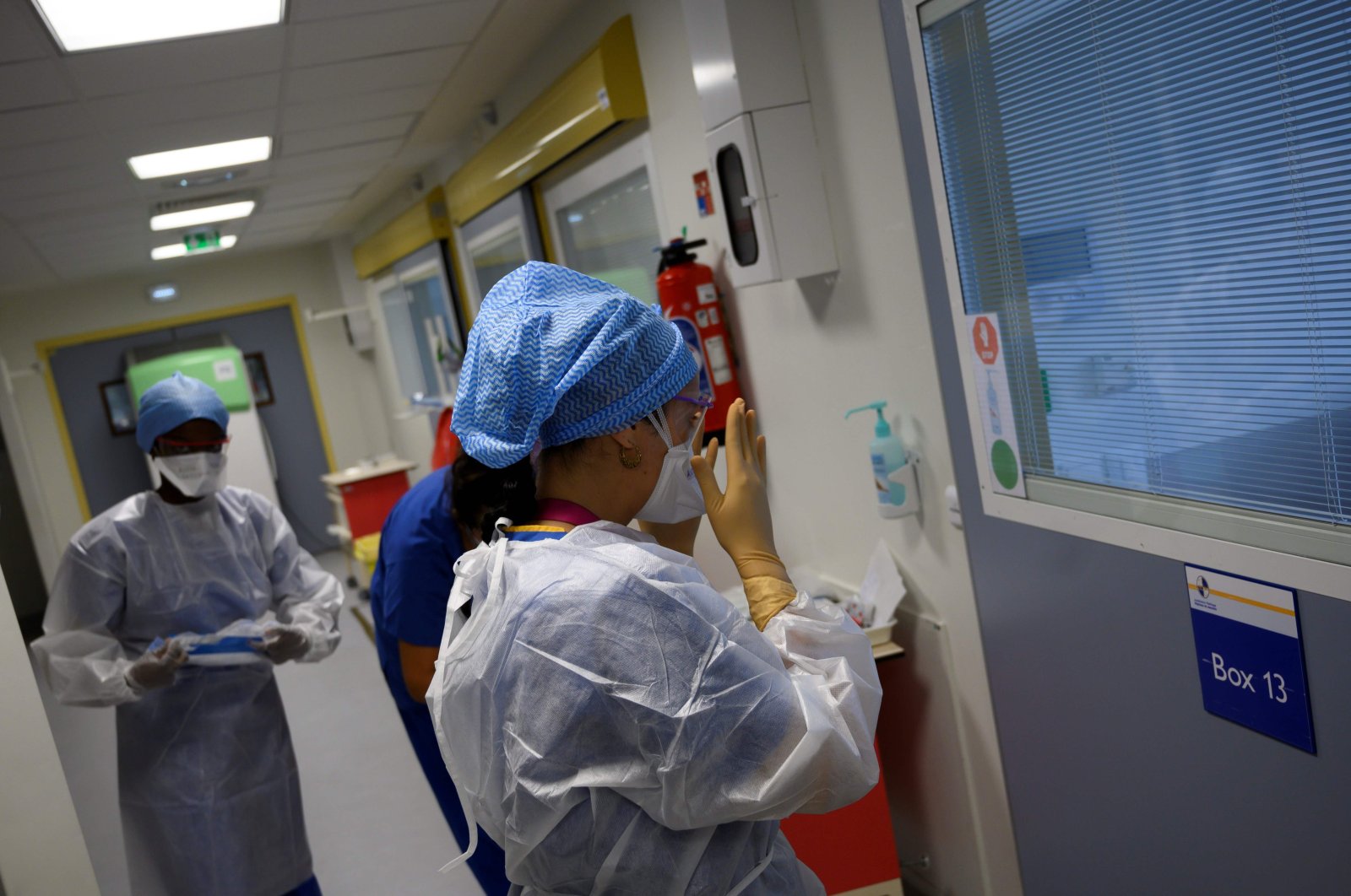 A Nurse gets ready to enter a room where a patient suffering from COVID-19 is hospitalized at the emergency unit of La Timone hospital in Marseille, southeastern France, on Sept. 11, 2020. (AFP Photo)