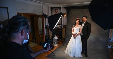 Ayşe Keleş and her husband Alp Çolak pose for a wedding photo shoot, in Istanbul, Turkey, Sept. 5, 2020. (AFP Photo) 