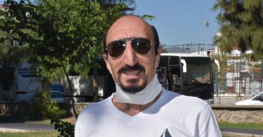 Mahir Çağrı, who rode a wave of popularity in 1999, is seen here in his hometown İzmir, western Turkey, Sept. 13, 2020. (DHA Photo)