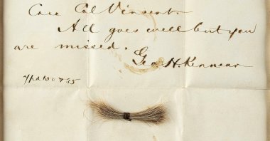 A bloodstained telegram and lock of hair from former U.S. President Abraham Lincoln, to be auctioned Sept. 12, Washington, D.C., July 2020. (Nikki Brickett/RR Auction via AP)