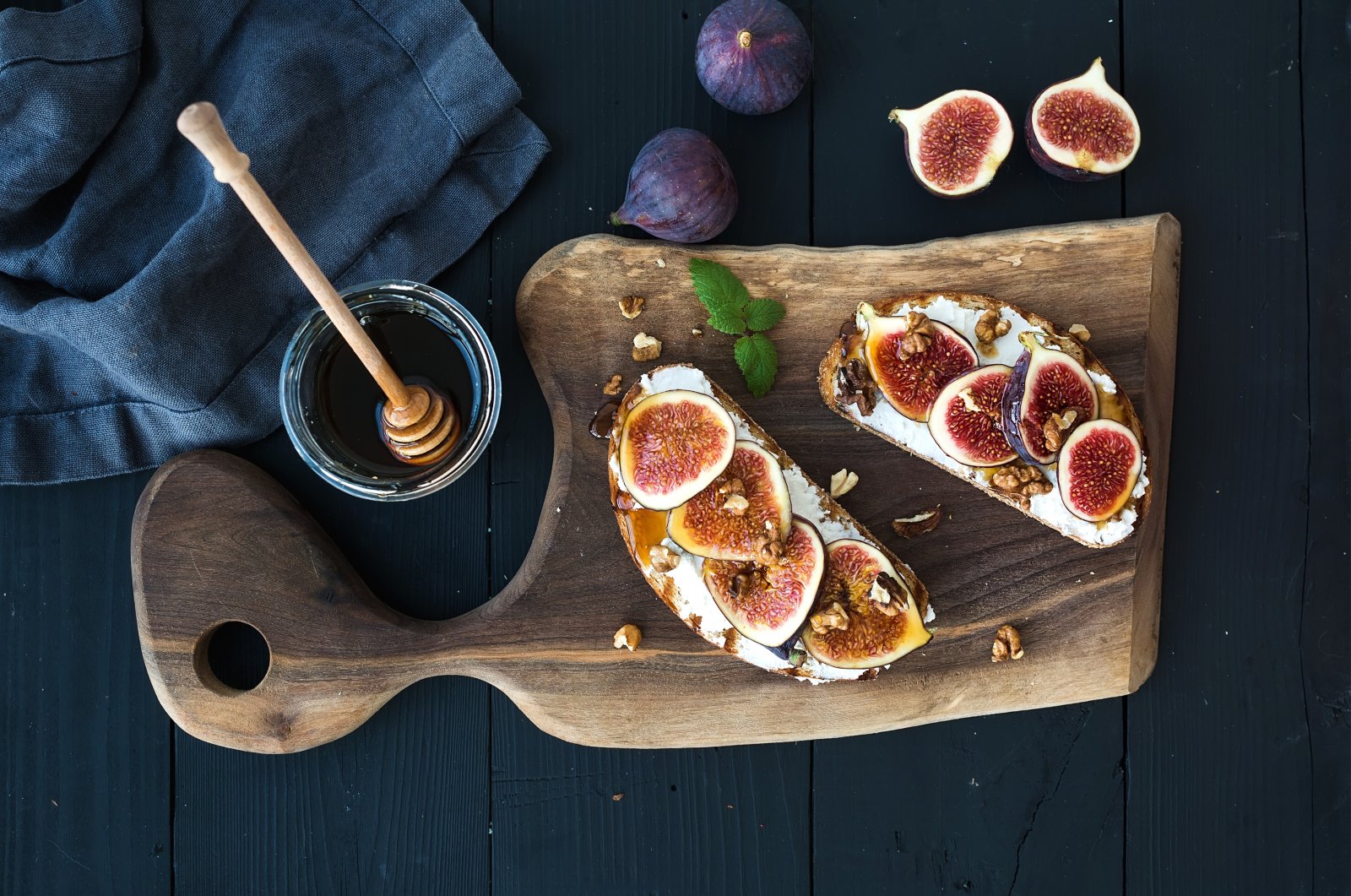 Ricotta, fresh figs, walnuts and honey go well on some homemade sourdough bread. (iStock Photo)