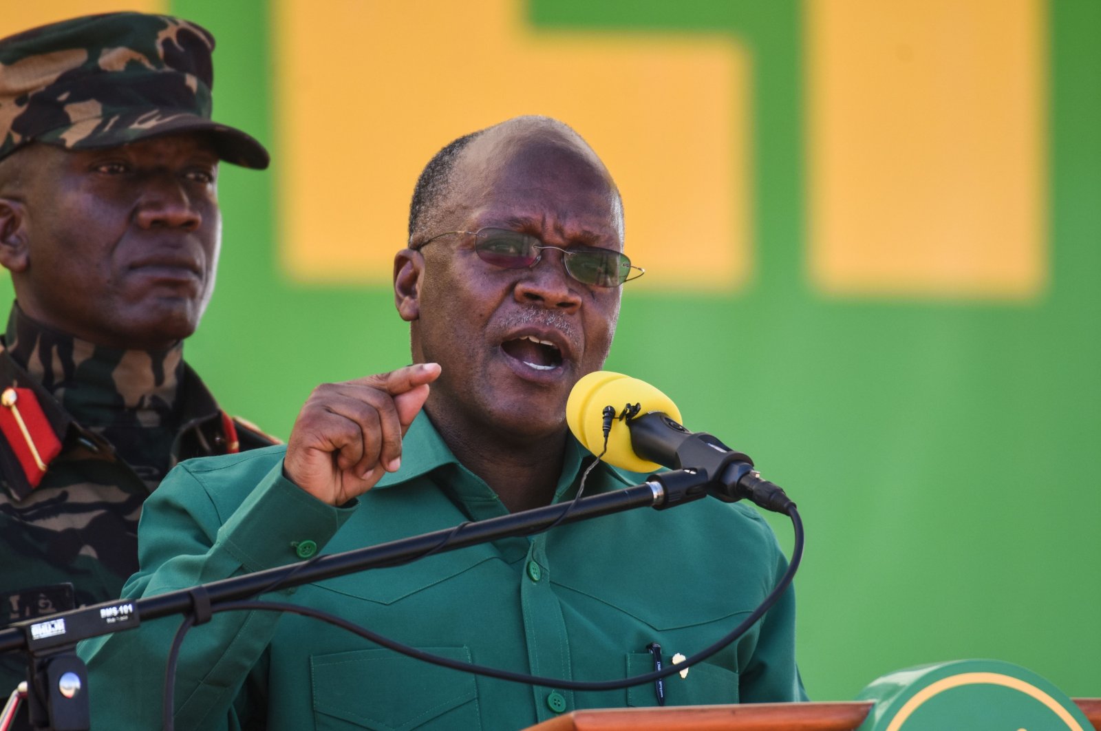 Tanzania's incumbent President and presidential candidate of ruling party Chama Cha Mapinduzi (CCM) John Magufuli (R) speaks during the official launch of the party's campaign for the October general election at the Jamhuri stadium in Dodoma, Tanzania, on Aug. 29, 2020. (AFP Photo)