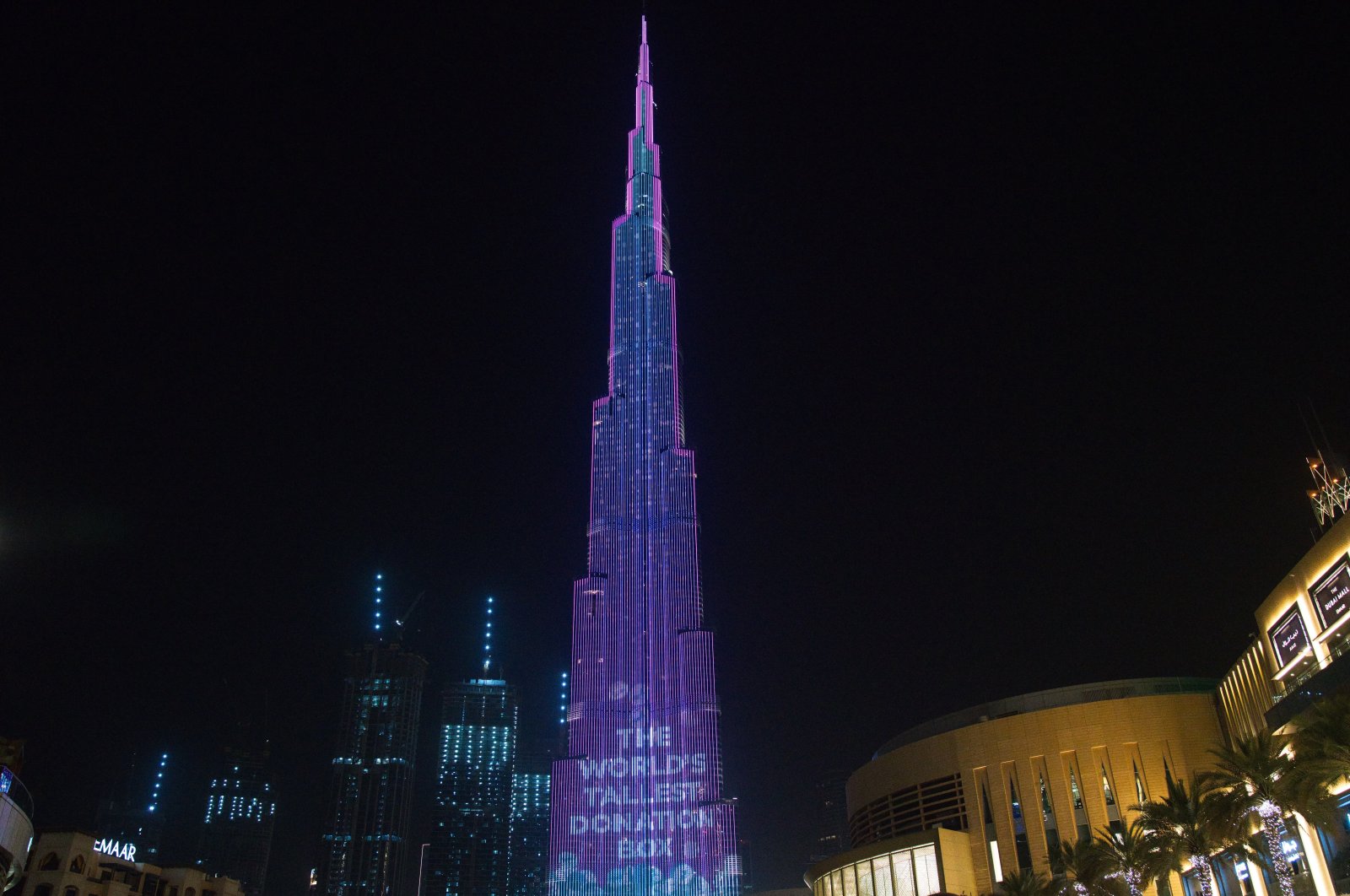 The Burj Khalifa, the world's tallest building, displays a message as part of the "World's Tallest Donation Box" campaign in Dubai, United Arab Emirates, Monday, May 11, 2020. (AP File Photo)