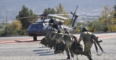 Turkish soldiers are getting ready for operation within the scope of the Lighting-10 Operation in eastern Van province, Sept.14, 2020. (DHA)