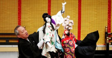 Bunraku puppeteer Kanjuro Kiritake, who was designated a Living National Treasure by the Japanese government, performs Bunraku during a program titled "Komochi Yamanba" ("The Pregnant Mountain Ogress") at the National Theatre in Tokyo, Japan, Sept.7, 2020. (REUTERS PHOTO)