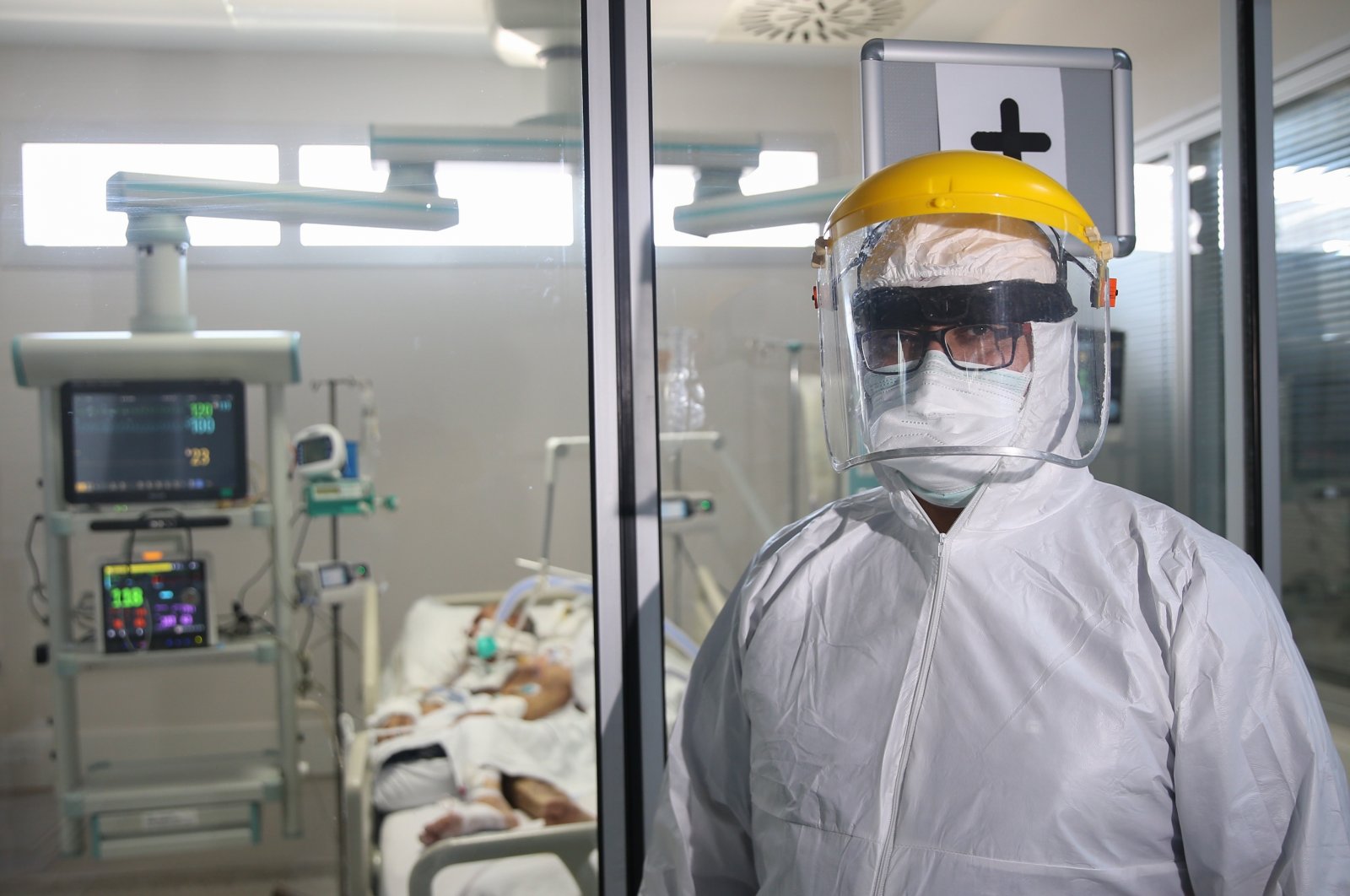 Murat Yılmaz wearing protective gear stands at the entrance to an intensive care unit at the Akdeniz University Hospital in Antalya, southern Turkey, Sept. 15, 2020. (AA Photo)