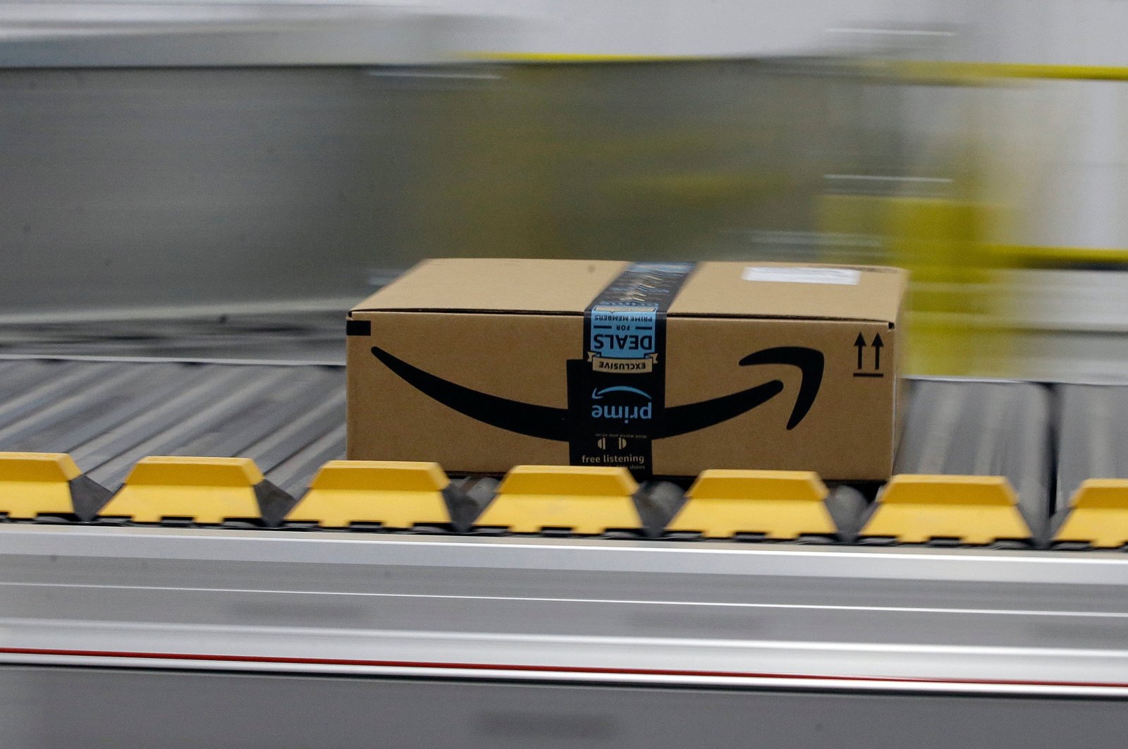 In this Feb. 9, 2018, file photo, a box for an Amazon prime customer moves through the new Amazon Fulfillment Center in Sacramento, Calif. (AP Photo)