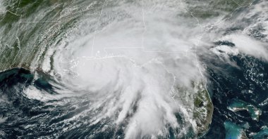 This GOES-16 GeoColor satellite image, provided by NOAA, shows Hurricane Sally moving slowly toward the coast from the Gulf of Mexico, at 3 p.m. EDT, Sept. 15, 2020. (AP Photo)