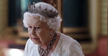 In this file photo, Britain's Queen Elizabeth II arrives at the picture gallery for the Queen's Dinner during the Commonwealth Heads of Government Meeting (CHOGM), at Buckingham Palace, London, April 19, 2018. (AFP Photo)