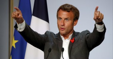 French President Emmanuel Macron gestures as he delivers a speech to French tech startups at the closing ceremony of the National Council of French Tech Capitals and Communities (CNCC), at the Elysee Palace in Paris, Sept. 14, 2020. (AP Photo)