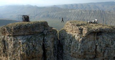 A still from Taus Makhacheva's "Tightrope," video, 2015.