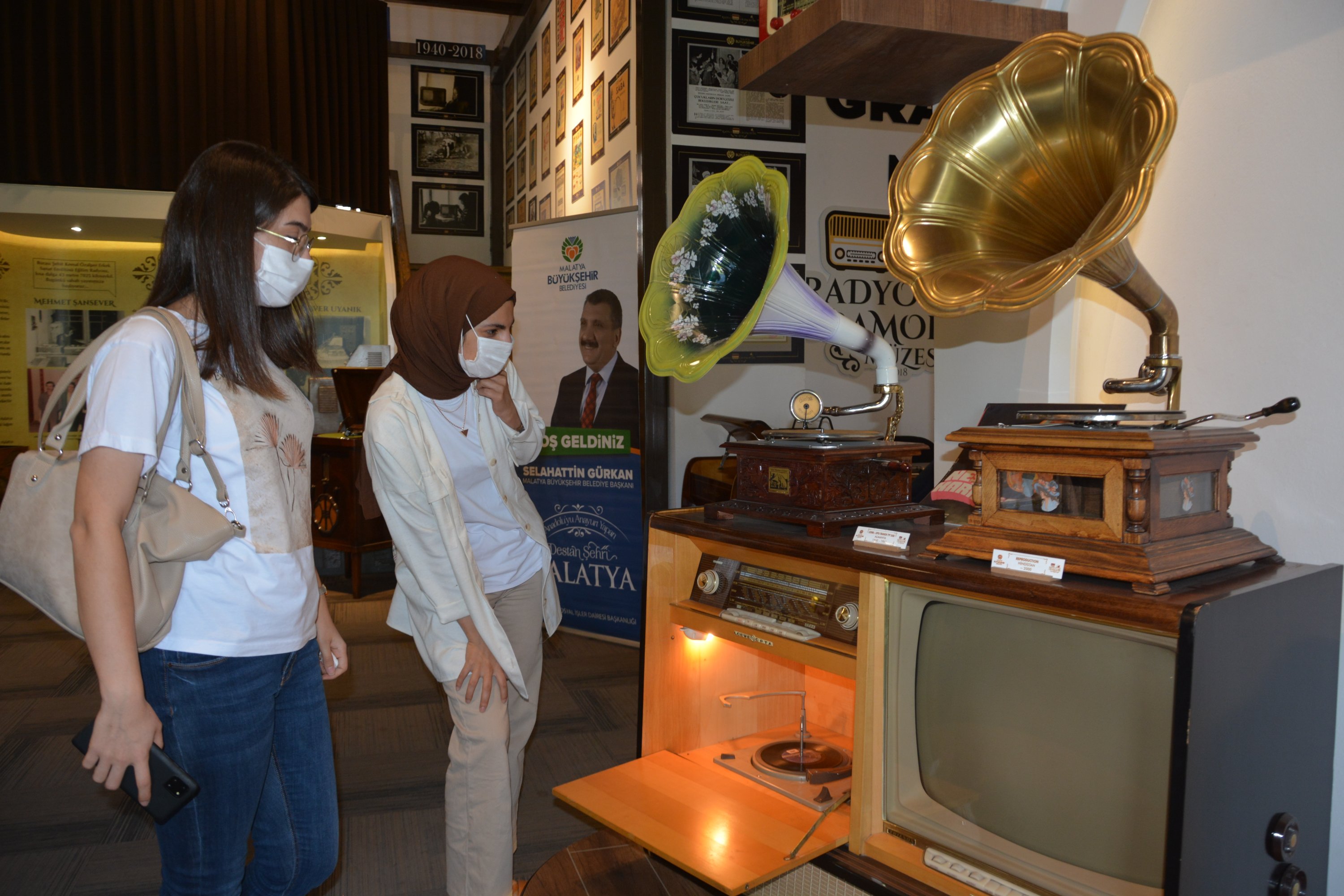 Two visitors examine phonographs at the museum, Malatya, eastern Turkey, Sept. 16, 2020. (AA Photo)