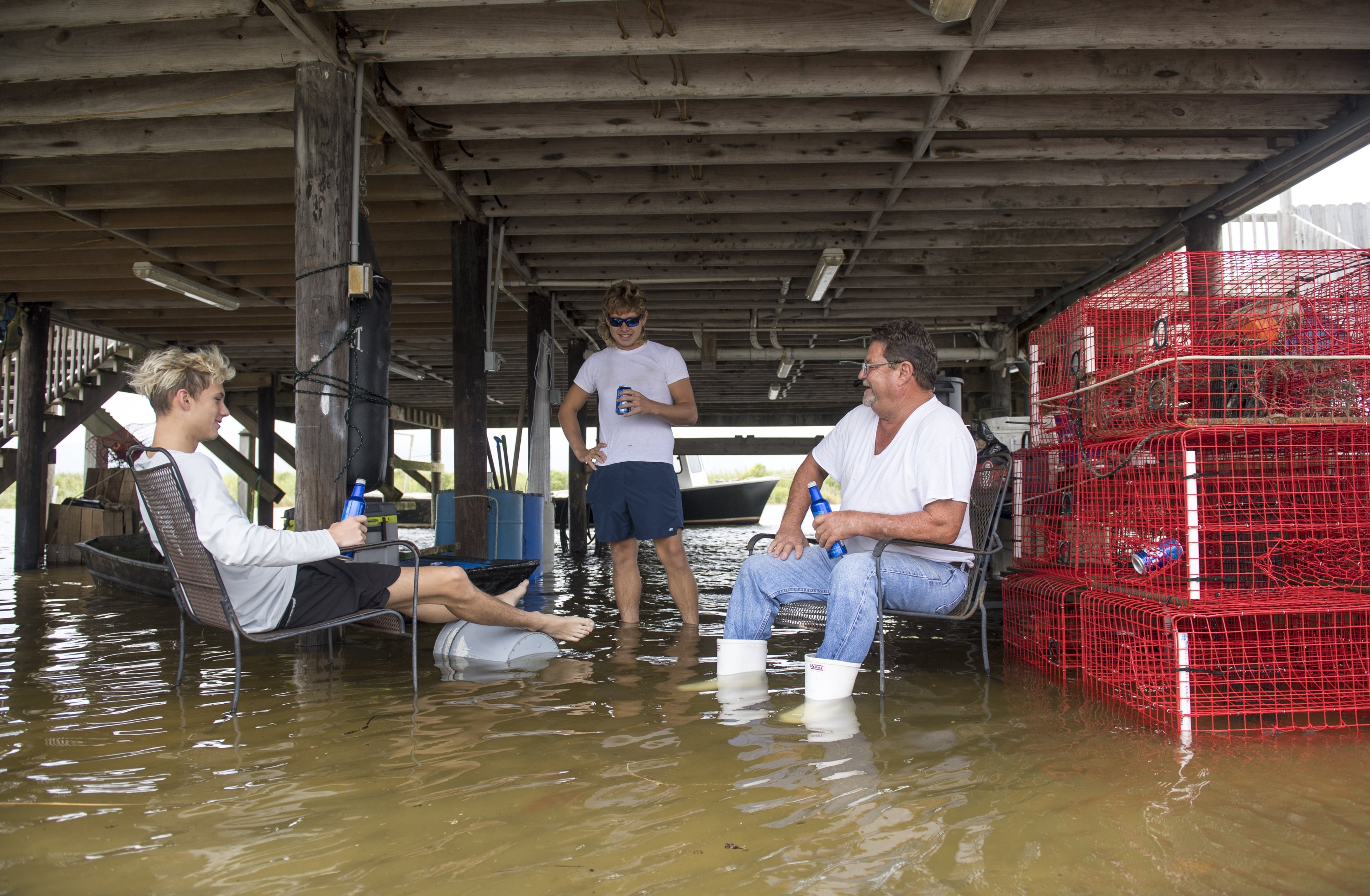 Uprooted trees, flooded streets: Hurricane Sally hits US Gulf Coast