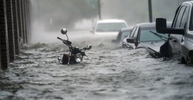 Floodwaters move on the street, Wednesday, Sept. 16, 2020, in Pensacola, Fla. (AP Photo)