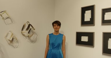 Sena Başöz poses with some of her works at the exhibition at KRANK Art Gallery, Istanbul, Turkey, Sept. 12, 2020. (AA Photo)