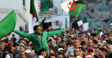 Demonstrators carry national flags during a protest in the capital Algiers, Algeria, Oct. 25, 2019. (REUTERS Photo)