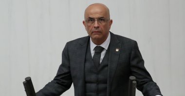 Enis Berberoğlu, a deputy from the main opposition Republican People's Party (CHP), takes his oath at the Turkish Parliament in the capital Ankara, Oct. 1, 2018. (Reuters Photo)