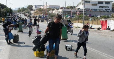 Refugees from Lesbos island move to a new facility in Kara Tepe camp, Sept.17, 2020. (AA)