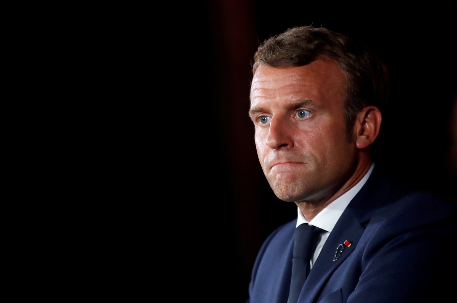 French President Emmanuel Macron looks on as he attends a news conference at the Pine Residence, the official residence of the French ambassador to Lebanon, in Beirut, Lebanon September 1, 2020. (REUTERS Photo)