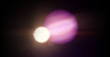 A handout photo made available by NASA shows an artist's impression of WD 1856 b, a potential Jupiter-size planet, orbiting its much smaller host star, a dim white dwarf, issued Sept. 17, 2020. (NASA Goddard Space Flight Center via EPA)