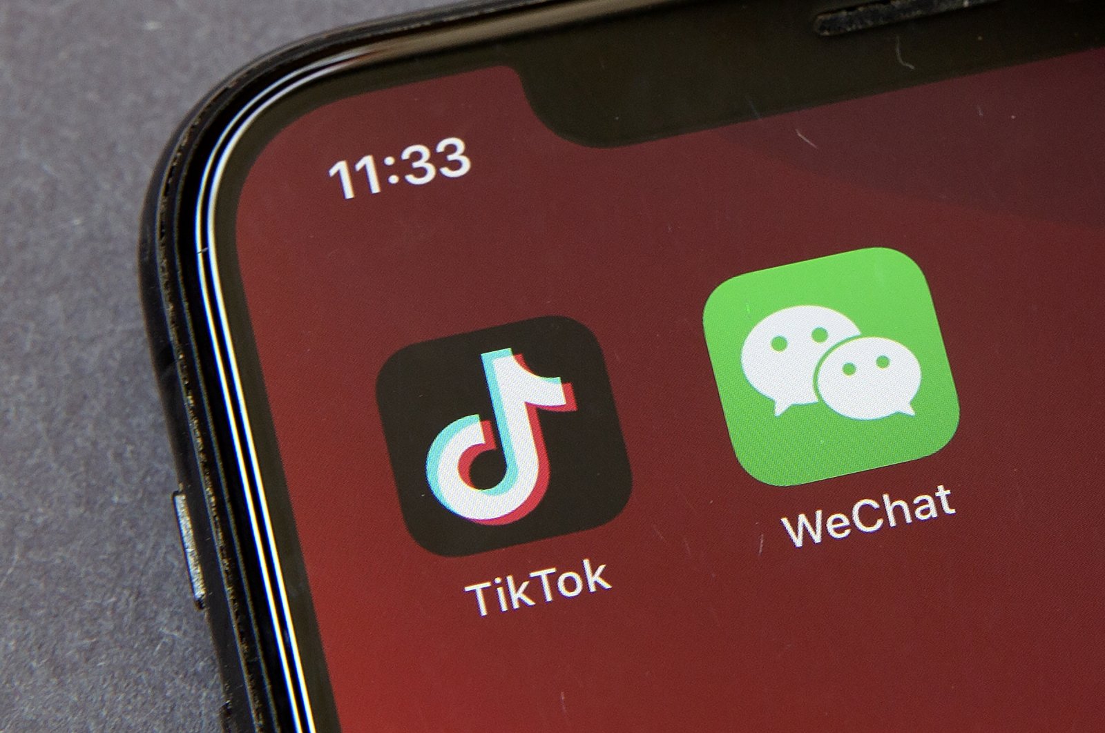 Icons for the smartphone apps TikTok and WeChat are seen on a smartphone screen in Beijing, in a Friday, Aug. 7, 2020 file photo. (AP Photo)