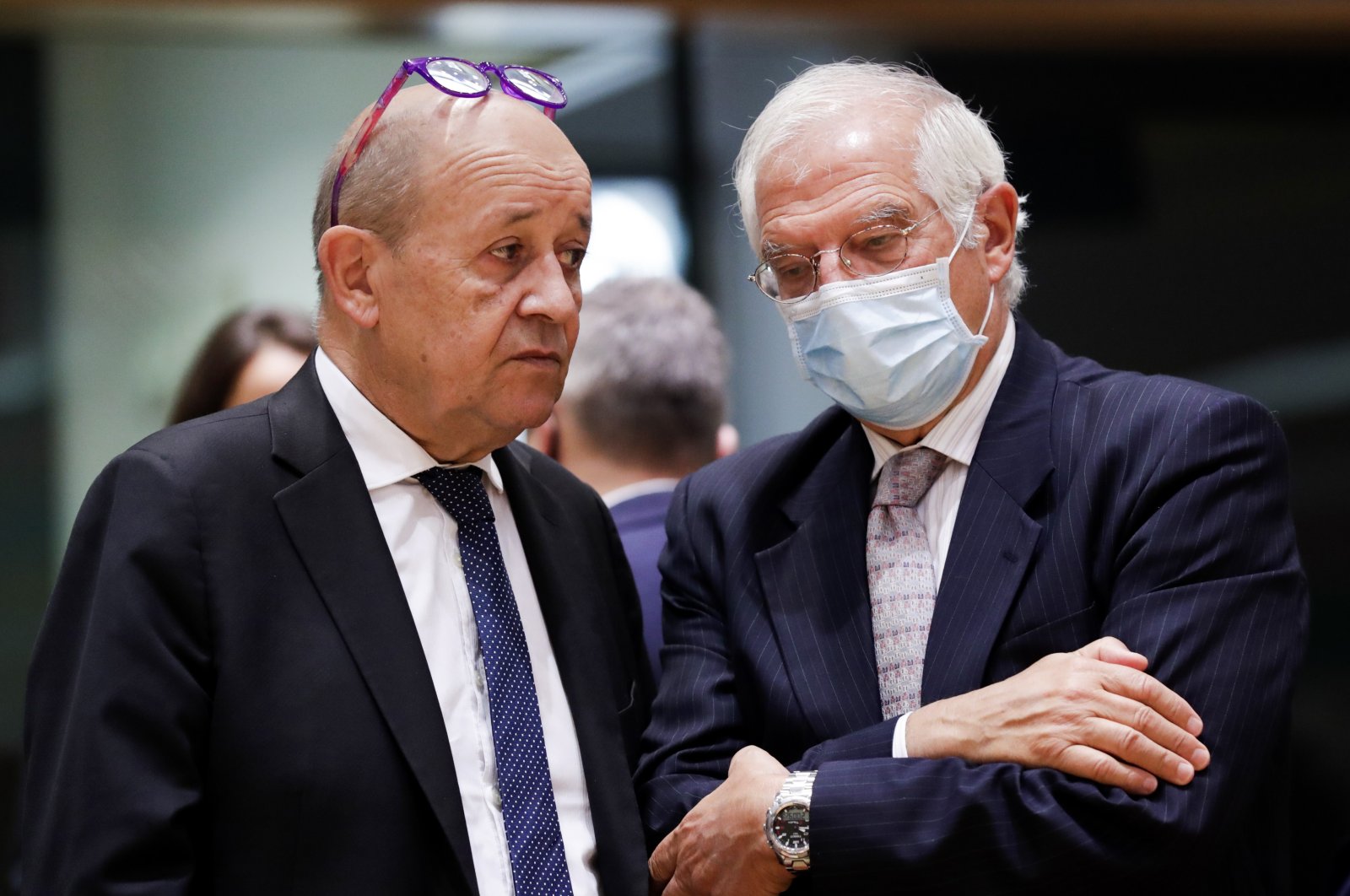 French Foreign Minister Jean-Yves Le Drian (L) speaks with European Union foreign policy chief Josep Borrell during a meeting of EU foreign affairs ministers at the European Council building in Brussels, Belgium, Sept. 21, 2020. (AP Photo)
