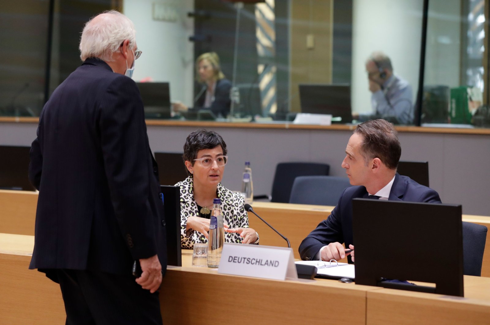 Josep Borrell (L), the European high representative of the Union for Foreign Affairs, chats with Spanish Foreign Minister Arancha Gonzalez Laya (C) and German Minister of Foreign Affairs Heiko Maas (R) during a Foreign Affairs Council meeting in Brussels, Belgium, Sept. 21, 2020. (AFP Photo)