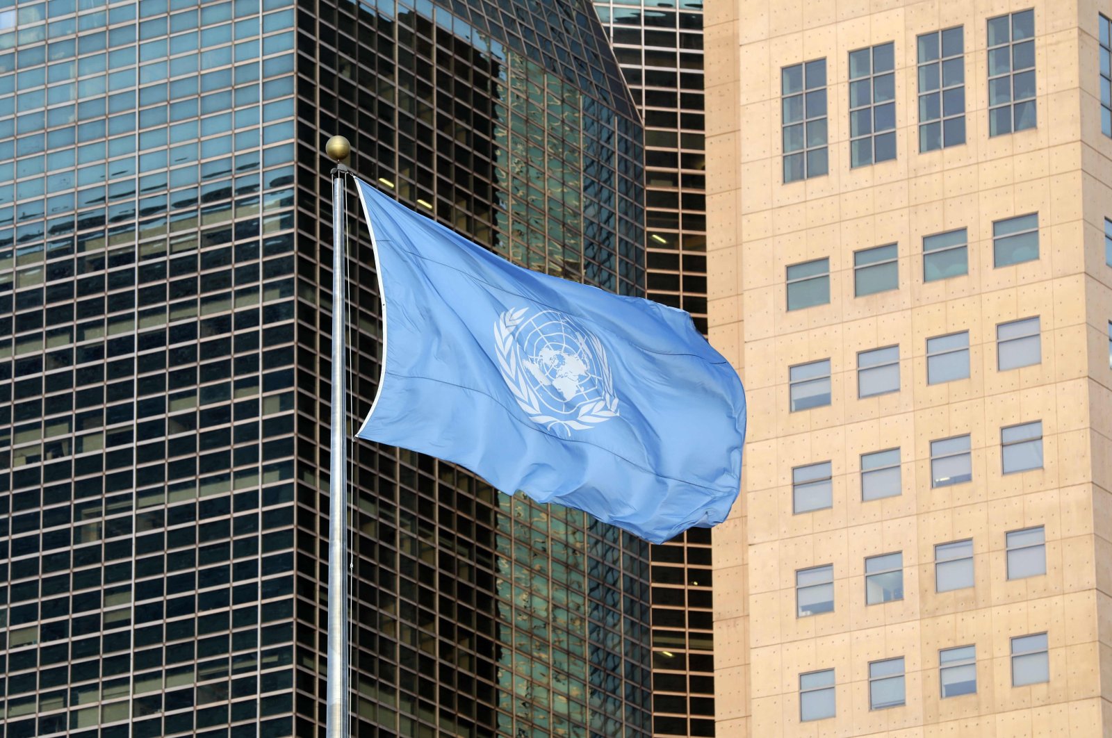 The United Nations flag waves near U.N. headquarters in New York, Sept. 23, 2019. (AFP Photo)