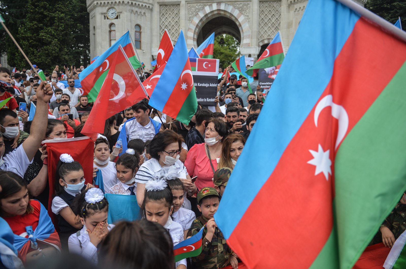 Protesters wave flags of Azerbaijan during a demonstration against Armenian aggression in Istanbul, Turkey, July 2020. (DHA Photo)