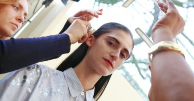 A model backstage prior to Akris show as part of the Paris Fashion Week Womenswear Spring/Summer 2015 on September 28, 2014 in Paris, France. (ABACAPRESS.COM via REUTERS)