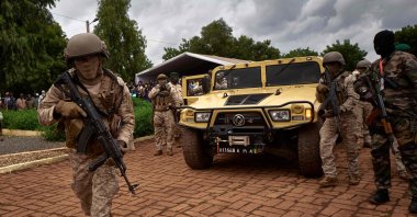 The armored vehicle of Col. Assimi Goita (C) arrives at the funeral of former Mali President Gen. Moussa Traore in Bamako, Mali, Sept. 18, 2020. (AFP Photo)