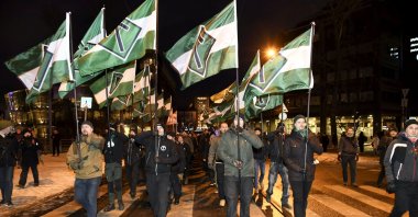Members of the far-right group Nordic Resistance Movement march during the festivities of the centenary of Finnish independence, Helsinki, Dec. 6, 2017. (REUTERS Photo)