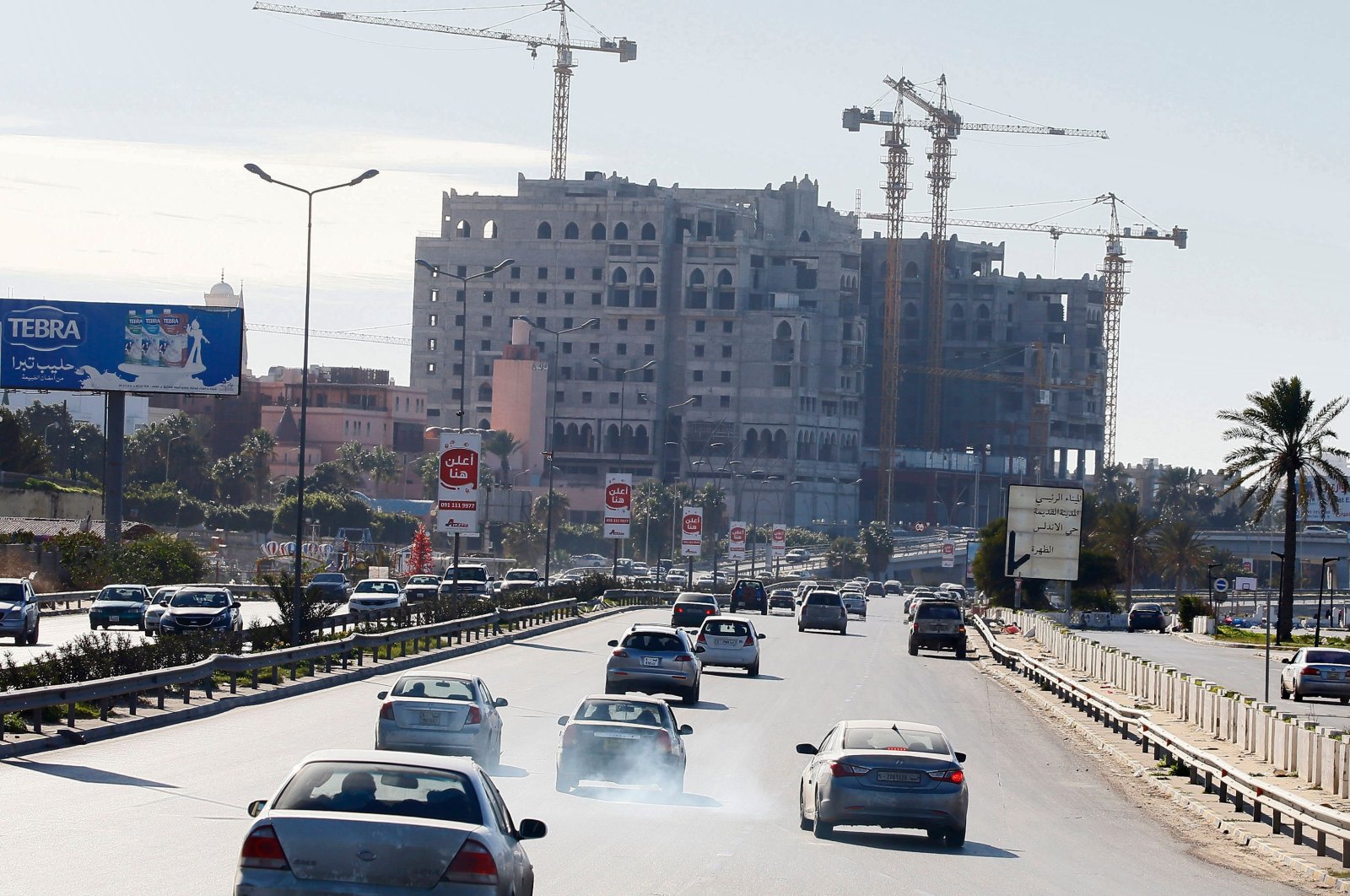 Libyans commute on a highway in the capital Tripoli, Libya, Feb. 3, 2020. (AFP Photo)
