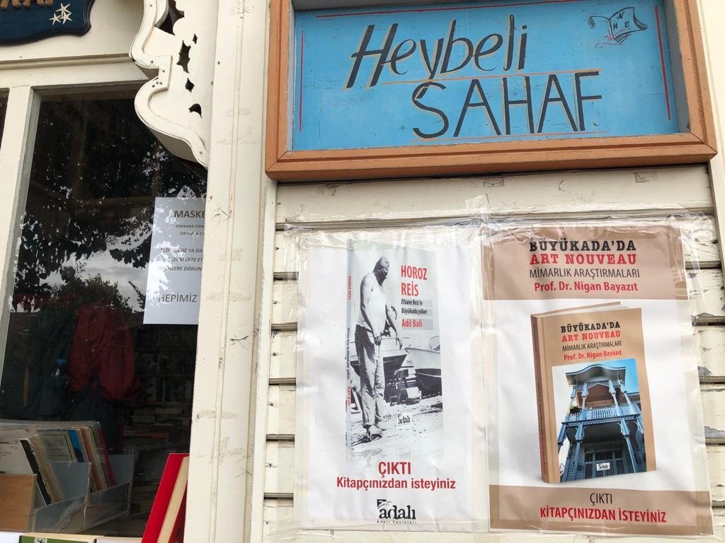 The entrance to Antiquarian Books and a sign that reads "Heybeli Sahaf." (Photo by Matt Hanson)