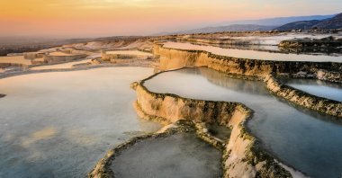 Natural carbonate travertine pools during sunset, Pamukkale, Turkey, Sept. 15, 2019. (iStockphoto)