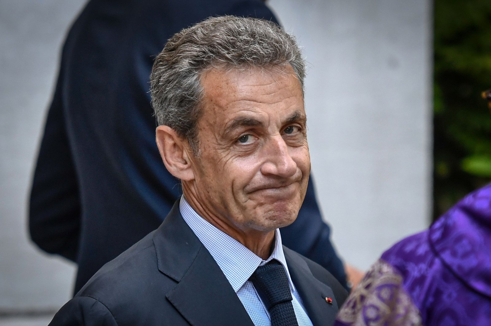 Former French President Nicolas Sarkozy leaves the mass for the funeral of late French Justice Minister Pascal Clement at Saint Peter's Church in Neuilly-sur-Seine, France, June 25, 2020. (AFP Photo)