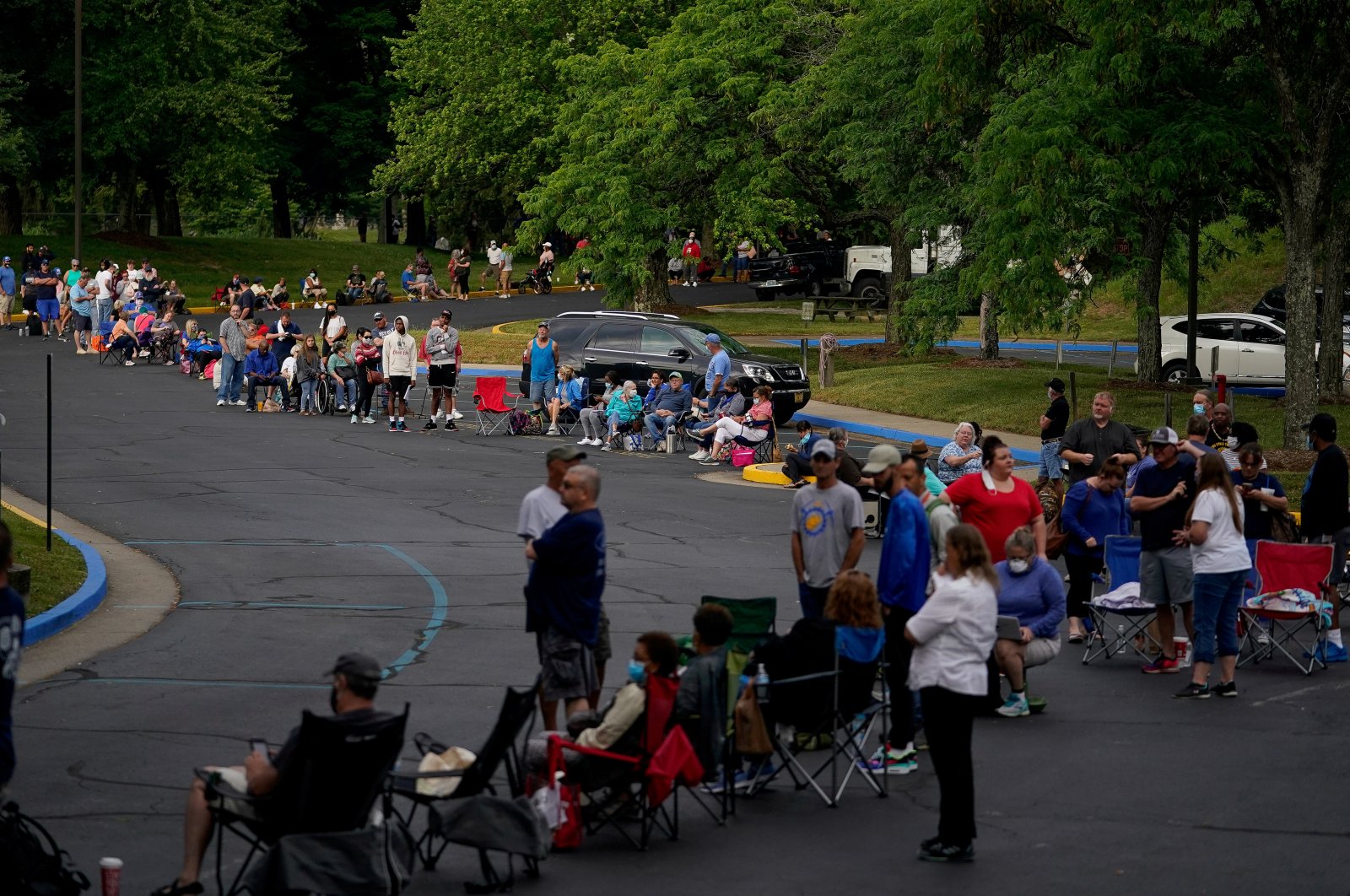 People line up outside Kentucky Career Center prior to its opening to find assistance with their unemployment claims in Frankfort, Kentucky, U.S. on June 18, 2020. (Reuters Photo)