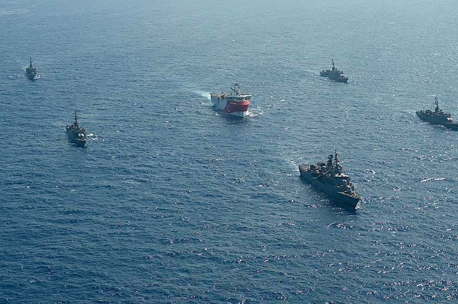Turkish seismic research vessel Oruç Reis is escorted by Turkish Naval ships in the Mediterranean Sea, off Antalya, August 10, 2020. (AFP Photo)
