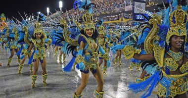 Members of Vila Isabel samba school perform during the last night of Rio's Carnival parade at the Sambadrome Marques de Sapucai in Rio de Janeiro, Brazil, Feb, 24, 2020. (AFP Photo)