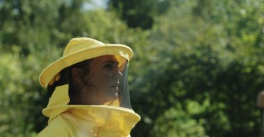 Actress Meryem Uzerli in the role of a beekeeper in "Kovan."