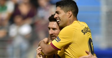 Barcelona's Luis Suarez (R) celebrates a goal with Lionel Messi during a La Liga match against Eibar, in Eibar, Spain, Oct. 19, 2019. (AP Photo)