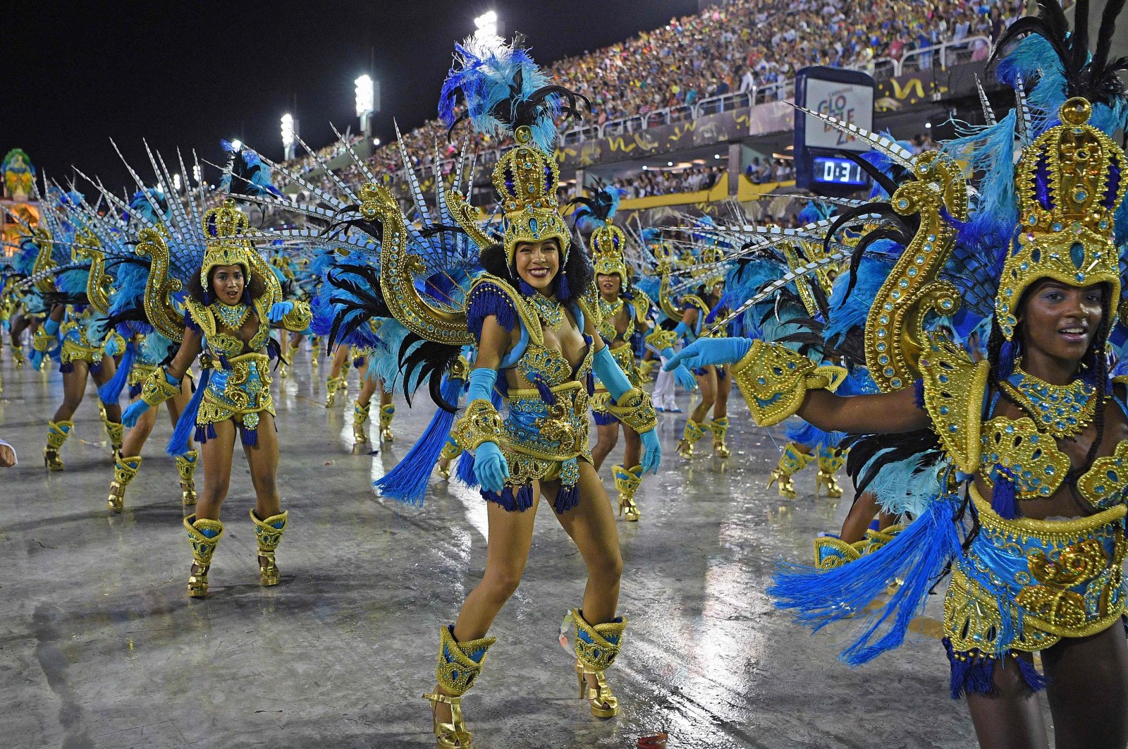 Members of Vila Isabel samba school perform during the last night of Rio's Carnival parade at the Sambadrome Marques de Sapucai in Rio de Janeiro, Brazil, Feb, 24, 2020. (AFP Photo)