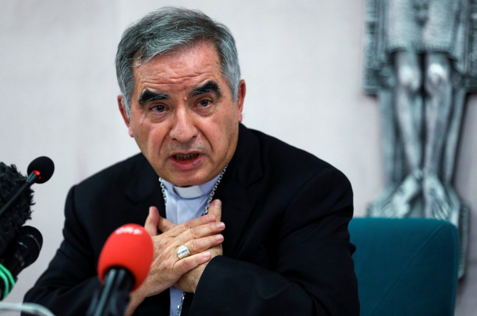 Cardinal Giovanni Angelo Becciu, who has been caught up in a real estate scandal, speaks to the media a day after he resigned suddenly and gave up his right to take part in an eventual conclave to elect a pope, near the Vatican, in Rome, Italy, September 25, 2020. (Reuters Photo)