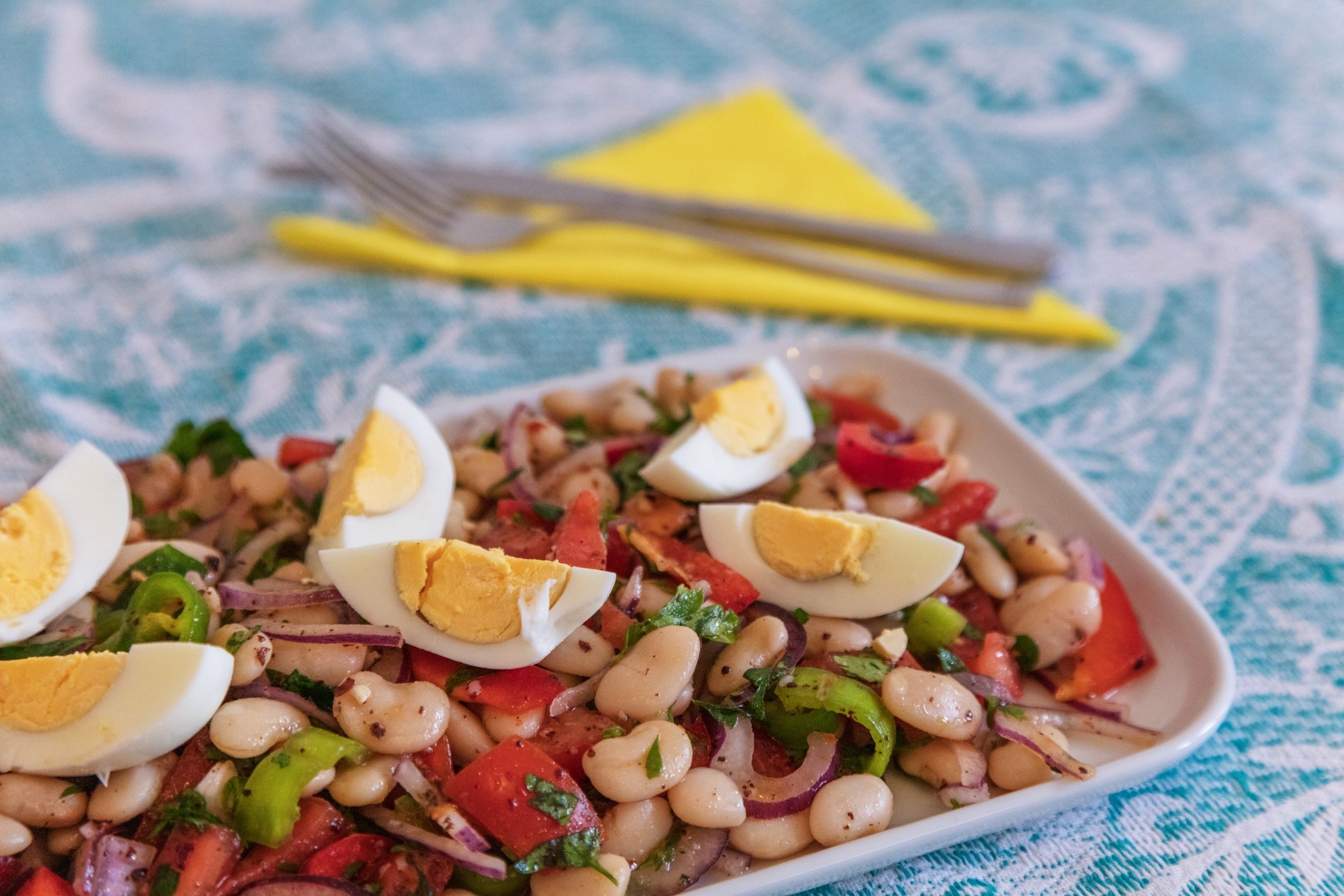 The Antalya way of doing the traditional Turkish bean salad piyaz includes eggs and tahini. (iStock Photo)