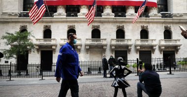 People walk in front of the New York Stock Exchange (NYSE) in lower Manhattan, New York City, Sept. 21, 2020. (AFP Photo)