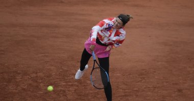 Victoria Azarenka serves in a match against Danka Kovinic, in Paris, France, Sept. 27, 2020. (AP Photo) 