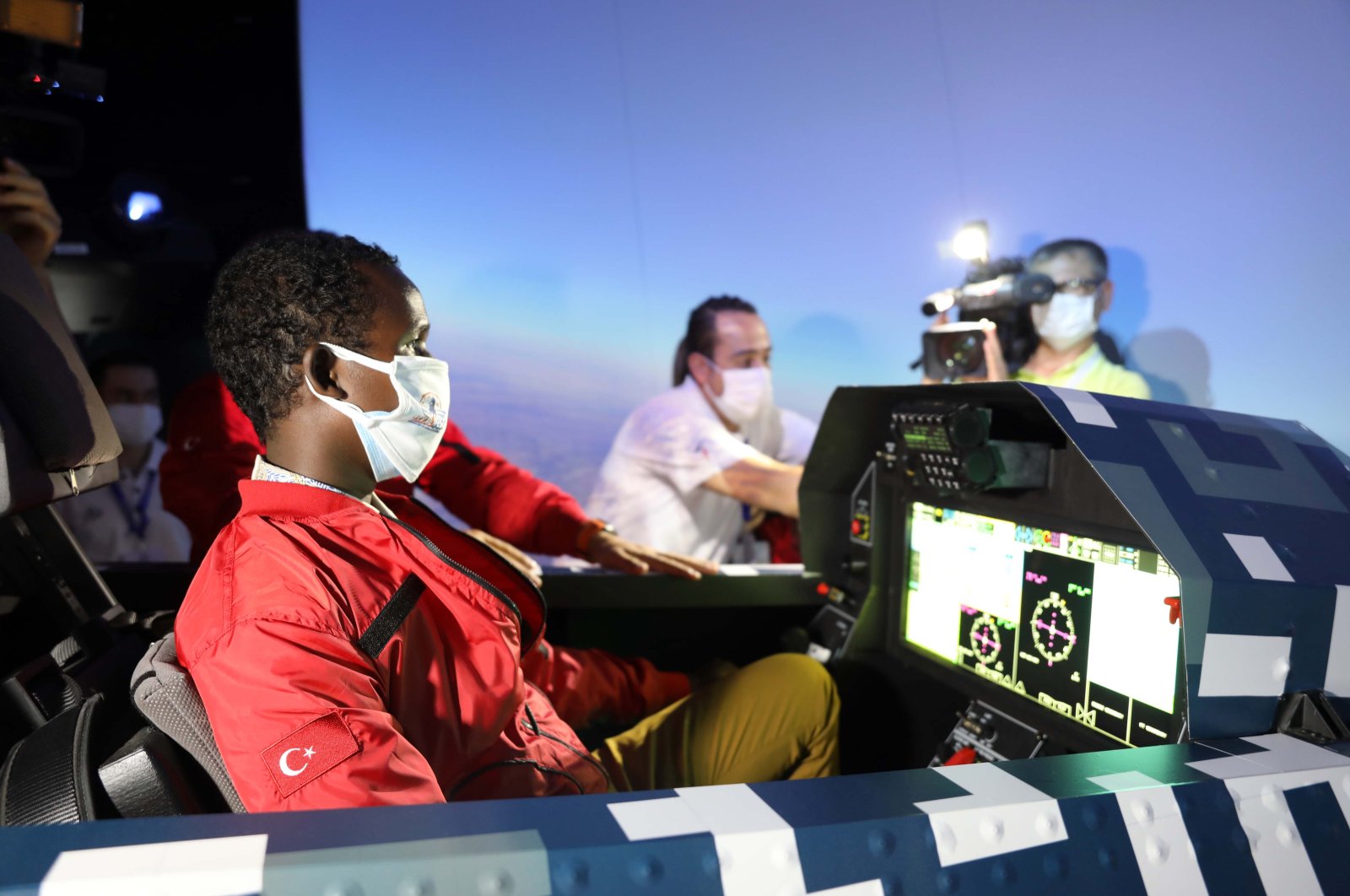 Guled Abdi in a flight simulator at Teknofest event, in Gaziantep, southern Turkey, Sept. 27, 2020. (DHA Photo) 