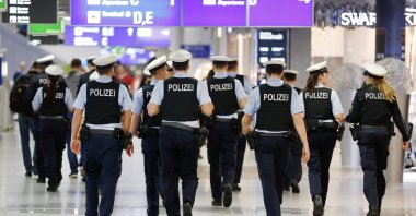 German police officers walk in a terminal at the airport, Frankfurt, Germany, March 23, 2016. (AP Photo)