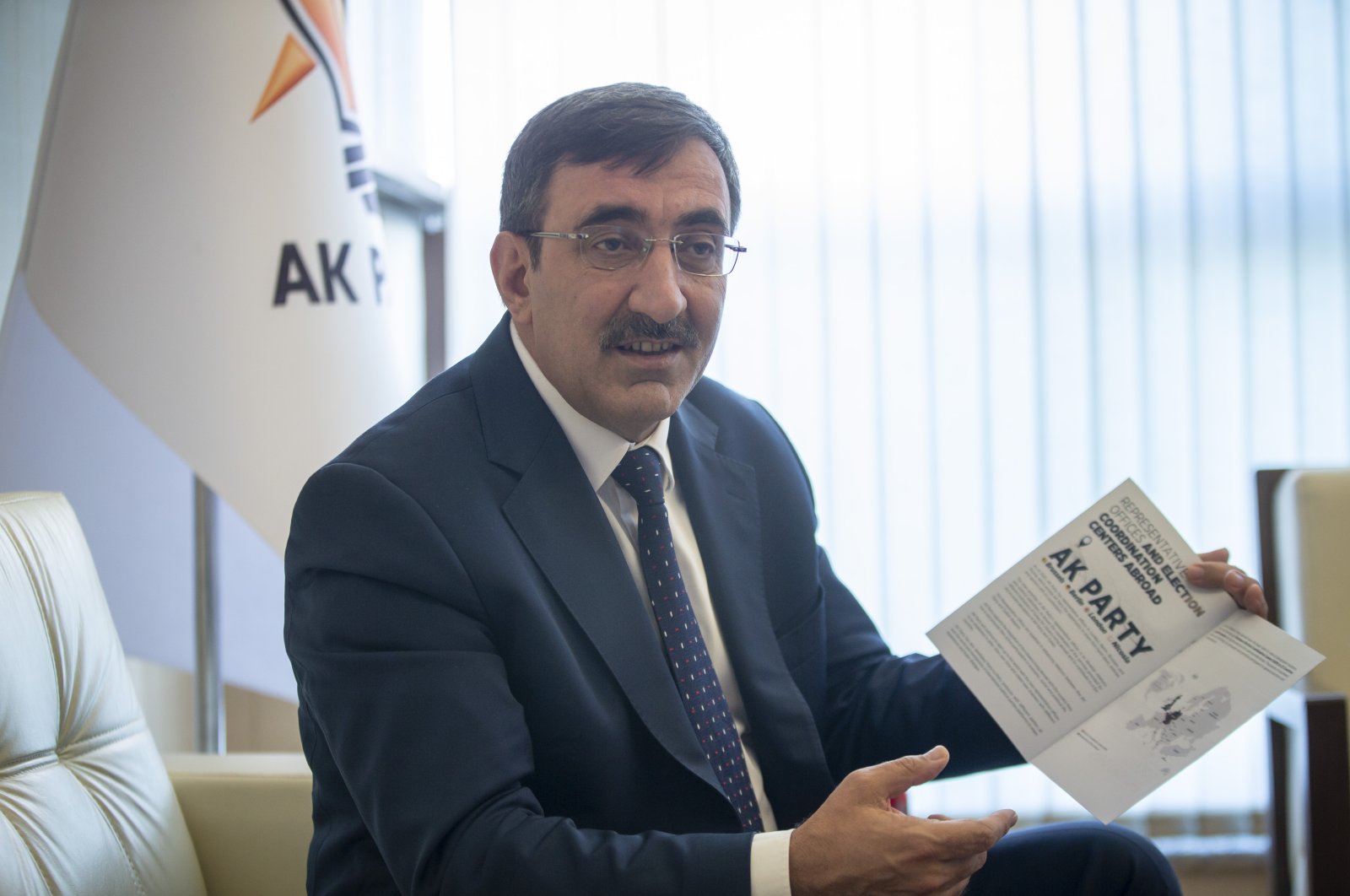 The ruling Justice and Development Party (AK Party) Deputy Chair Cevdet Yılmaz explains about the booklets prepared by the party, Sept. 28, 2020. (AA Photo)